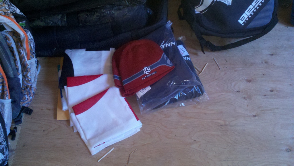 Peter Lynn beanies, hoodies, and swag from Vela - plus the 1 week stay in the manilla envelope!
