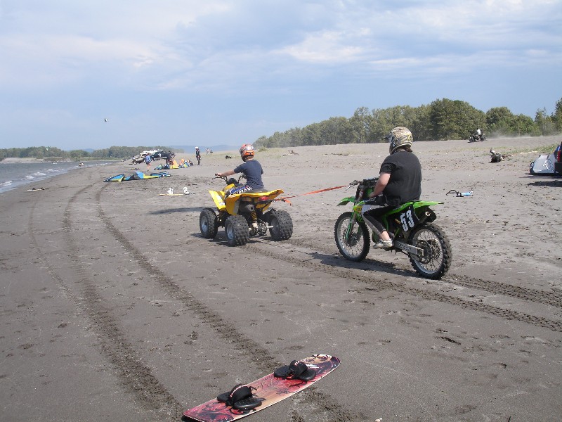 Some Kooks.....The fat kid on the dirt bike was start'n to piss me off...I guess they don't have enough space to ride over the dunes...This pop tart was riding too close to the kites...