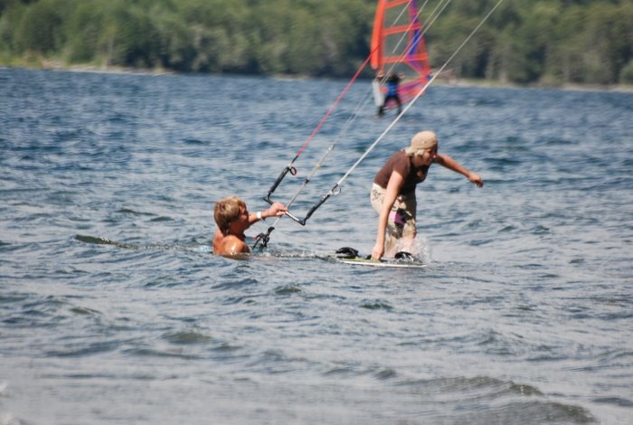 Josh's pit crew makes a last minute board change before a heat.