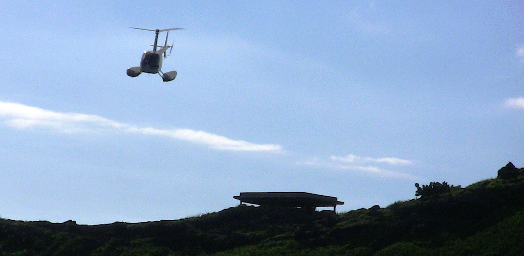 This guy did a touch & go on the heli pad in 20mph+ winds on the top of the mountain