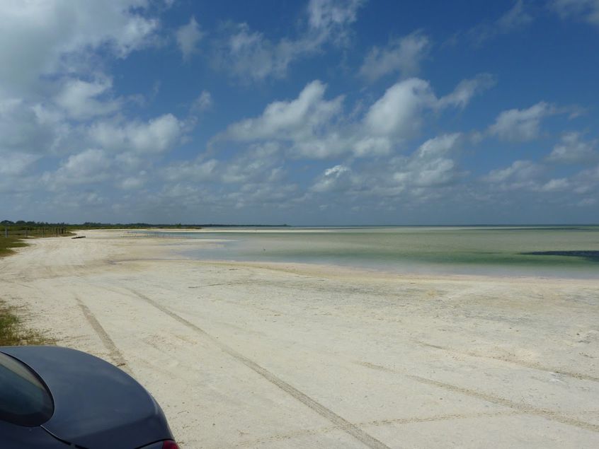 Isla Blanca with maybe 10 mph offshore winds.  There were probably 5 of us kiting about 1 hour after this photo was taken.  You can touch as far as the water is light green.