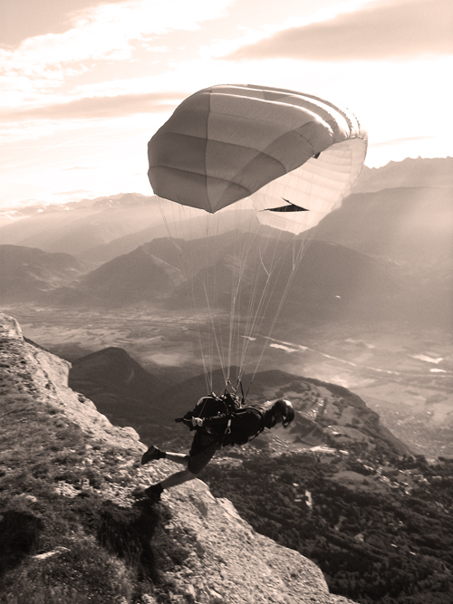 Here is Daniel launching that cliff from our morning flight.  Bitch of a hike, but worth in the end.  This is officially my largest cliff launch EVER!