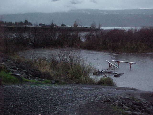 water flowin' through the rock jetty