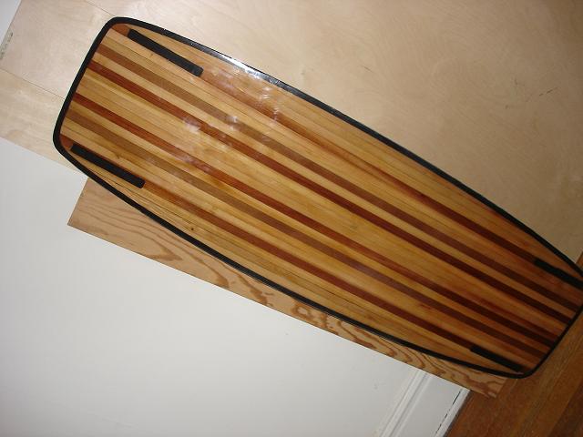 Shiny but has plenty of dust spots  <br />-waiting to see how it rides to do any final finishing board is heavy so prob will just wet sand it...