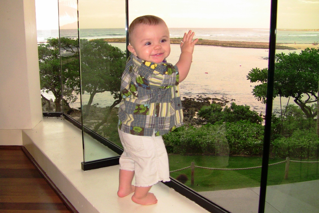 Not walking yet Nicole, standing a lot and workng on balance...