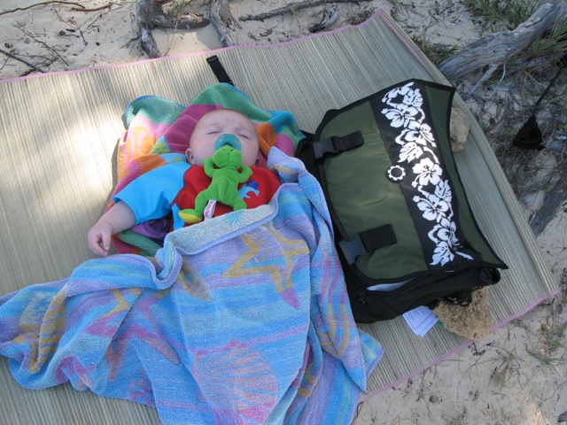 We were super lucky that Slater slept on a noisy, windy beach while we kited.  :)